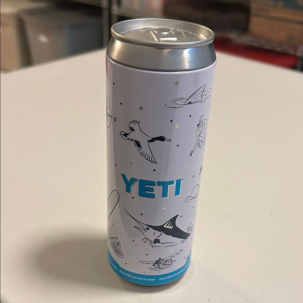 Yeti White Slim Can Tumbler with Teal Logo and Nautical Graphics